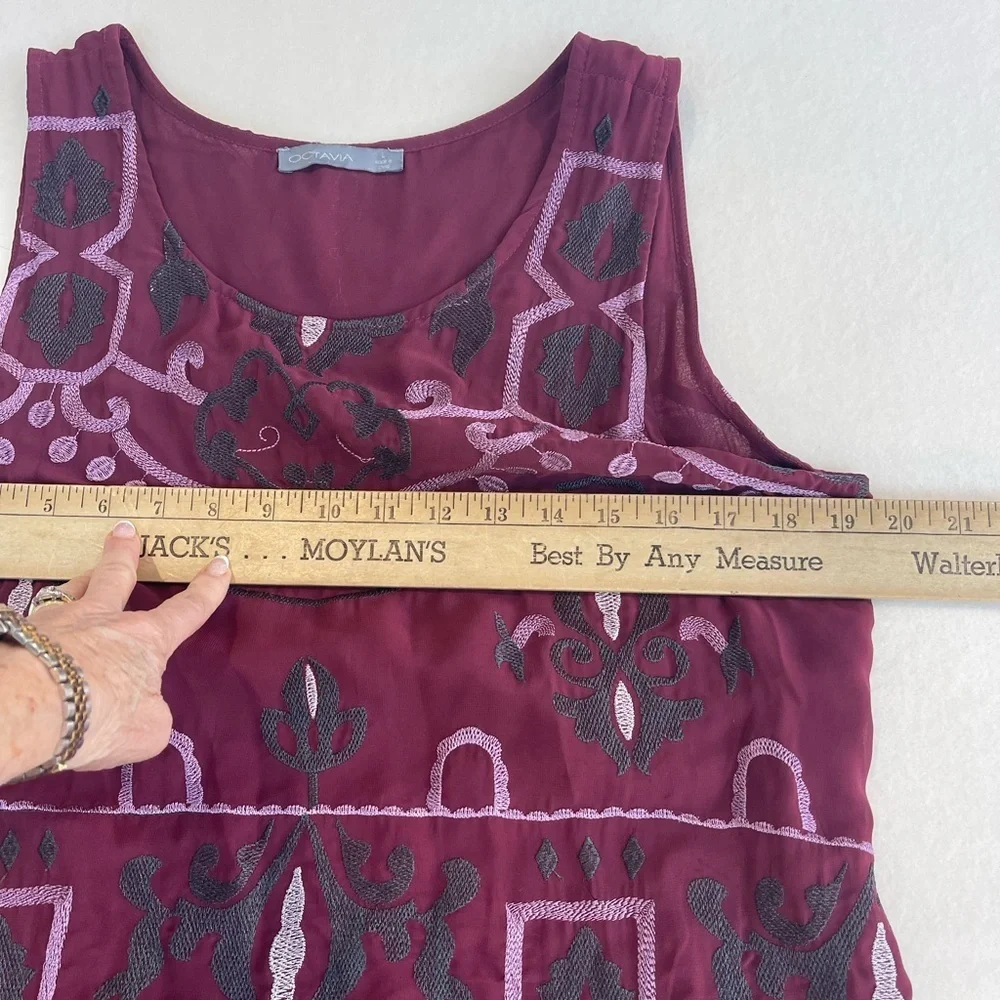Octavia sleeveless embroidered tunic top. Fully lined. In new like condition.LG